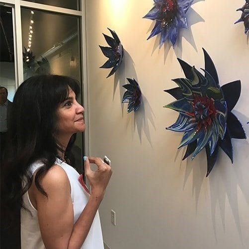 Passionately pursuing the creation of glass artwork including glass sinks, glass wall hangings, glass lamps, glass tableware & table tops, and glass jewelry, Hasna Sal studied fine art in England and Wales with an exhibition of watercolor renderings at the Cornwall Museum in 1997.